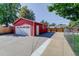 Detached two-car garage with concrete driveway at 4145 Otis St, Wheat Ridge, CO 80033