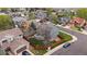 Bird's-eye view of a blue home with manicured lawn and a fenced backyard in a suburban setting at 5486 S Cathay Way, Centennial, CO 80015