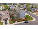 Aerial view of a well-maintained home with a fenced backyard in a peaceful residential neighborhood at 5486 S Cathay Way, Centennial, CO 80015