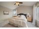 Relaxing main bedroom featuring vaulted ceilings, neutral carpeting, and natural light at 5486 S Cathay Way, Centennial, CO 80015