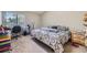Comfortable bedroom with a large window and neutral decor at 3596 S Depew St # 2, Lakewood, CO 80235