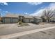 Charming townhomes with a well-maintained exterior and convenient parking at 3596 S Depew St # 2, Lakewood, CO 80235