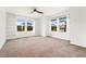 Bright bedroom with built-in shelves and windows offering plenty of natural light at 3692 Celestial Ave, Castle Rock, CO 80109