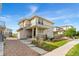 Two-story home with neutral siding, a covered front porch, and a well-maintained front yard at 3692 Celestial Ave, Castle Rock, CO 80109