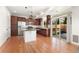 Modern kitchen with stainless steel appliances, granite countertops, and hardwood floors at 3692 Celestial Ave, Castle Rock, CO 80109