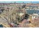 Aerial view of building with city view in the background at 1605 Saint Paul St # 6, Denver, CO 80206