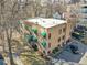 Aerial view of a multi-unit residential building, showing the roof and landscaping at 1605 Saint Paul St # 6, Denver, CO 80206