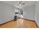 Bright bedroom with hardwood floors and natural light coming through two windows at 1605 Saint Paul St # 6, Denver, CO 80206