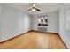 Bright bedroom with radiator, hardwood floors and natural light from large window at 1605 Saint Paul St # 6, Denver, CO 80206