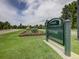 Entrance to City Park, featuring lush greenery and well-maintained flower beds at 1605 Saint Paul St # 6, Denver, CO 80206