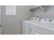 Laundry room featuring modern appliances at 3342 N Buchanan Way, Aurora, CO 80019