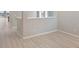Bright living room featuring stylish flooring and neutral paint at 3342 N Buchanan Way, Aurora, CO 80019