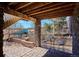 Outdoor patio featuring pavers, brick columns, a fire pit and comfortable seating for outdoor relaxation at 6019 S Little River Way, Aurora, CO 80016