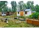 Garden plot with shed, chicken coop, and garden boxes at 2200 Teller St, Lakewood, CO 80214