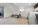 Open basement area with laundry, storage, and modern finishes at 2200 Teller St, Lakewood, CO 80214