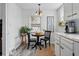 Eat-in kitchen with a small breakfast table and chairs at 2200 Teller St, Lakewood, CO 80214
