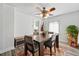 Dining room with seating, wooden floors and a plant at 2200 Teller St, Lakewood, CO 80214