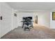 Functional office space with dual monitors, sliding barn door, and natural light at 2200 Teller St, Lakewood, CO 80214