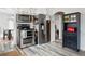 Stainless steel appliances decorate this stylish kitchen, including microwave, oven, and refrigerator at 2200 Teller St, Lakewood, CO 80214
