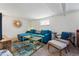 Comfortable living room with stylish decor, plush seating, and warm lighting at 2200 Teller St, Lakewood, CO 80214