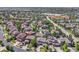 Aerial view of a neighborhood showcasing its layout, landscaping, and proximity to local amenities at 25402 E Glasgow Pl, Aurora, CO 80016