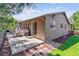 Backyard patio featuring outdoor seating, a grill, and convenient access to the home's interior at 25402 E Glasgow Pl, Aurora, CO 80016