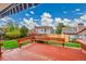 A spacious wood deck with built-in seating, perfect for outdoor entertainment in a charming backyard setting at 12287 W Aqueduct Dr, Littleton, CO 80127