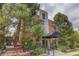 The building exterior features a covered entry with a decorative garden at 21 N Washington St # 301, Denver, CO 80203