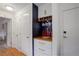 Hallway featuring a dry bar and plenty of storage and cabinet space at 21 N Washington St # 301, Denver, CO 80203