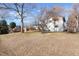 Spacious backyard with green grass and mature trees at 6190 W Canyon Ave, Littleton, CO 80128