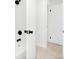 Clean white tiled shower features sleek matte black shower hardware at 6190 W Canyon Ave, Littleton, CO 80128