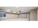 Basement entertainment area with projector and screen at 4251 Perry St, Denver, CO 80212