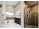 Contemporary bathroom with a glass shower and soaking tub at 4251 Perry St, Denver, CO 80212