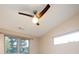 Bedroom with a modern ceiling fan and multiple windows allowing ample natural light at 4251 Perry St, Denver, CO 80212