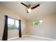 Bright bedroom with large window and ceiling fan at 4251 Perry St, Denver, CO 80212