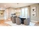 Elegant dining room with modern chandelier, comfortable seating, and stylish decor, perfect for entertaining guests at 4251 Perry St, Denver, CO 80212