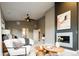 Luxurious main bedroom with a modern fireplace and stylish decor at 4251 Perry St, Denver, CO 80212