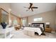 Expansive main bedroom with a modern ceiling fan and large windows at 4251 Perry St, Denver, CO 80212