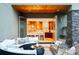 Outdoor patio with a seating area that opens to the gourmet kitchen through retractable doors at 4251 Perry St, Denver, CO 80212