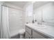 Updated bathroom with shower, vanity, toilet and updated flooring at 46565 Avery Ln, Bennett, CO 80022