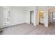 Bright bedroom features neutral carpet and a sliding door closet at 1255 Penner Dr, Erie, CO 80026
