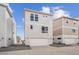 Modern home exterior featuring a two-car garage and contemporary design at 1255 Penner Dr, Erie, CO 80026