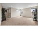 Spacious loft area with carpet flooring and natural light at 844 Dakota Ln, Erie, CO 80516