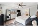 This main bedroom has a large window for natural light and an attached bathroom for convenience at 9077 W 88Th Cir, Denver, CO 80021