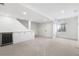 Finished basement featuring carpet, a beverage fridge, a bar, and white cabinets at 10978 Ashurst Ln, Highlands Ranch, CO 80130