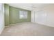 Bedroom featuring a carpeted floor, a ceiling fan, and a closet with sliding doors at 10978 Ashurst Ln, Highlands Ranch, CO 80130