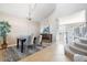 Dining area adjacent to staircase, showcasing neutral colors and easy access to the kitchen at 10978 Ashurst Ln, Highlands Ranch, CO 80130