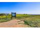 Trail entrance with signage, leading to hiking trails through natural meadows and scenic overlooks at 10978 Ashurst Ln, Highlands Ranch, CO 80130