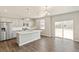 Modern kitchen featuring an island, stainless steel appliances, and ample counter space at 14249 Beebalm Ave, Parker, CO 80134