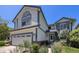 View of a two-story home showcasing its architectural design and inviting entrance at 17045 Hastings Ave, Parker, CO 80134
